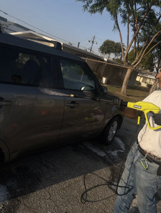 Phantom Auto Detailing — washing a Kia Soul in South Central LA