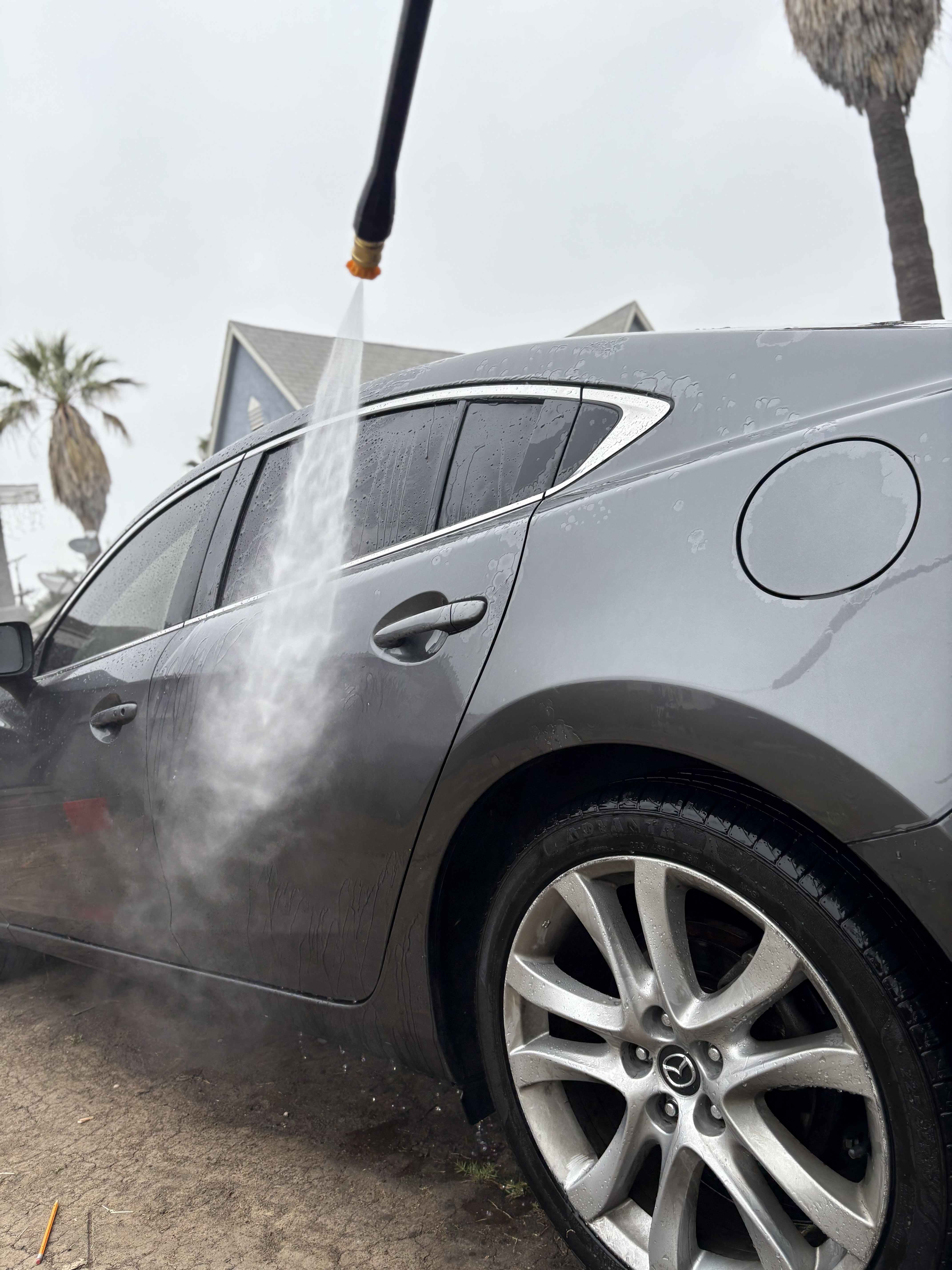Spraying a Mazda exterior